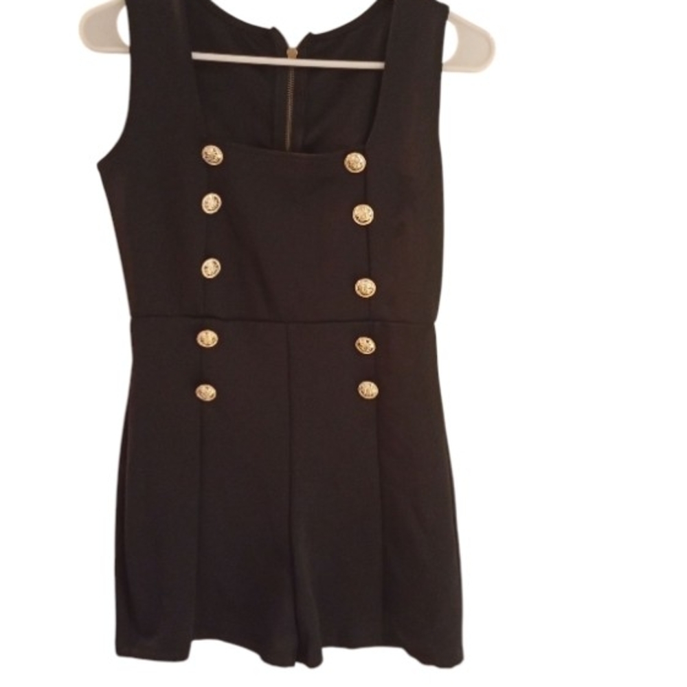 Elegant Black Sleeveless Dress with Gold Accents
